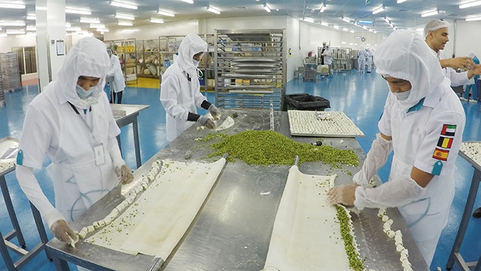 Hult Dubai students making chocolate