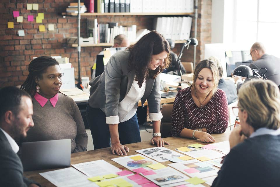 Women at office discussing business plans